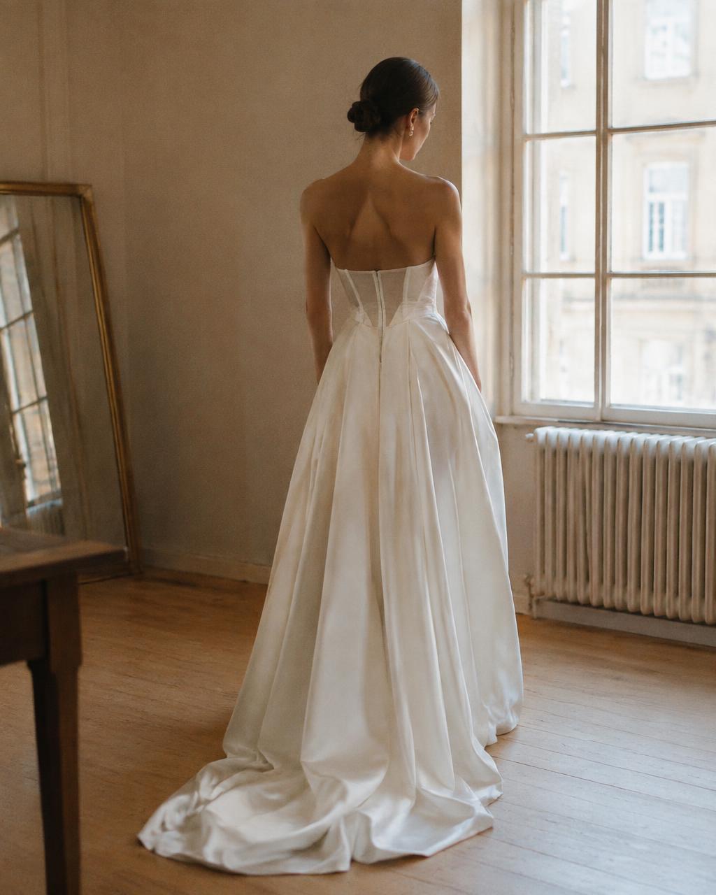 Grain, the shaped back and full skirt