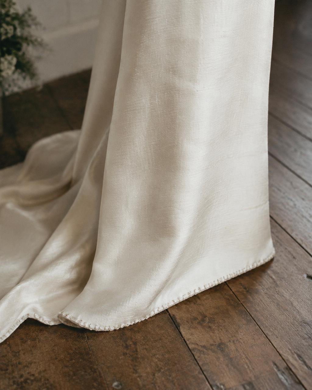 Terre, hand-finished raw silk hem
